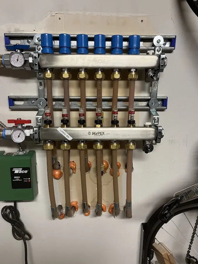 Plumber performing Water Heater Repair at a residential property in Stratford